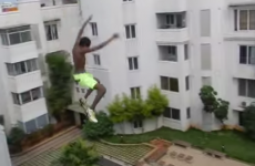 Guy jumps off five-storey building into swimming pool