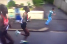 Little Scottish boy tries to race marathon runners... and it ends in a faceplant
