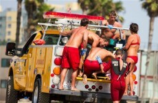 Man killed as 13 hit by lightning on busy beach