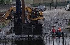 Work on Kilkenny bridge resumes - while protesters are nearby on river