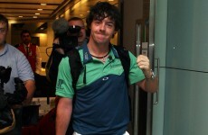 In the swing: this is the first of many for Rory