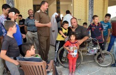 Thousands of Iraqis flee ISIS militants in panic as France calls 'urgent' UNSC meeting