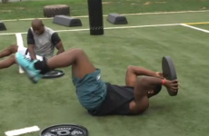 NFL running back fires 45lb plate downfield 'like a frisbee'