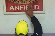 Jurgen Klopp pays respects to Liverpool by touching 'This Is Anfield' sign