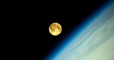 You think the supermoon looks cool out your window? Check it out from ISS