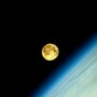 You think the supermoon looks cool out your window? Check it out from ISS