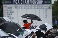 Rain threatens to delay McIlroy's back-to-back major quest until Monday