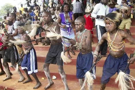 Boys from the Bukusu ethnic group, which prefers traditional circumcision using simple tools and no anesthesia, attend a circumcision ceremony in Bungoma, western Kenya.