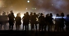 Teen shooting: Tear gas and smoke bombs used on protesters