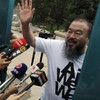 Freed Ai Weiwei silenced and still followed by Chinese authorities