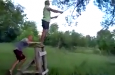 Russian man tries to jump on to a rope swing, fails horribly