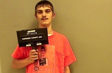 Teenager poses for greatest, most meta mugshot ever