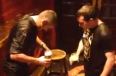 Two lads do the ice bucket challenge while having pints in Temple Bar