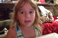 Little girl tries to convince mam she didn't eat a doughnut...with chocolate all over her face