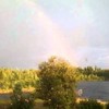 Rainbow admirer narrowly misses being hit by lightning