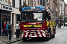 Three injured in crash between fire engine and car