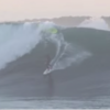 Hero surfer switches surfboards, MID-WAVE
