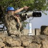 Syrian troops and Islamist rebels exchange fire near peace line in Golan Heights