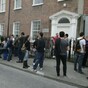 Students from closed colleges must be in education for immigration reasons - Minister