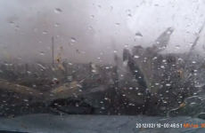 Russian man reverses out of his garage straight into a massive tornado
