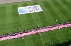 More than 1,000 people set a new world record for the largest ever scrum