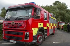 Woman in critical condition after escape from house fire