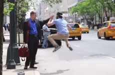 Man runs around New York high fiving people trying to hail taxis