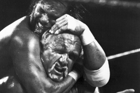  In this April 4, 1989 file photo, Randy "Macho Man" Savage, top, has challenger Hulk Hogan in a headlock during the main event for Wresltemania V in Atlantic City