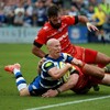 Peter Stringer finishes off a length-of-the-field Bath try against Leicester