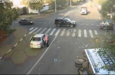 Luckiest cyclist in Russia has insanely close call with car and lorry