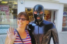 A man dressed as a gimp is wandering around Essex, taking selfies with locals