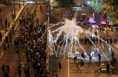 Hong Kong protesters stay on streets despite tear gas and riot police