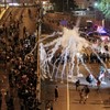 Hong Kong protesters stay on streets despite tear gas and riot police