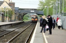 Rogue protester disrupts trains by chaining himself to bridge