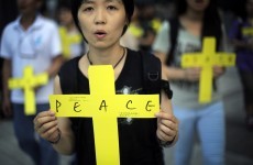Thousands gather for defiant peace rally in Hong Kong