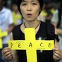 Thousands gather for defiant peace rally in Hong Kong