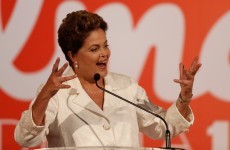 Brazil's president sees off ex-maid and 'smooth operator' to win first-round vote