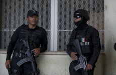 Police disarmed after accusations of conspiring with crime gang over 43 missing students