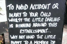 Pub defends sign which offers to 'nail noisy children to a table'