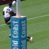 Fiji player is way too cool about touching down, gets smashed