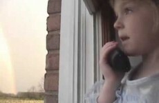 Little girl rings her grandma to let her know a rainbow is hitting her house