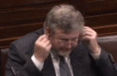 What is James Reilly listening to? (Because it isn't Richard Boyd Barrett)