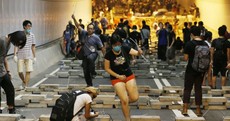 IN PICTURES: Hong Kong protesters battle police to build bamboo barricades
