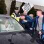 Joan Burton is, in fact, "delighted" that people have expensive phones and cameras