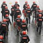 Police in Malaysia fire tear gas at protesters, arrest 1,667