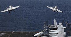 US-led air strikes have killed 553 people in Syria in a month