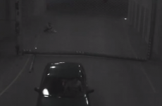 Angry driver tries to fight car park barrier, loses