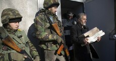 Ukrainian voters head to the polls in snap elections for a new parliament