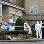 Bodies of couple and teen daughters found in UK house