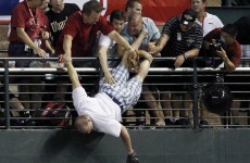 In pictures: Fan nearly falls from stands during homer derby